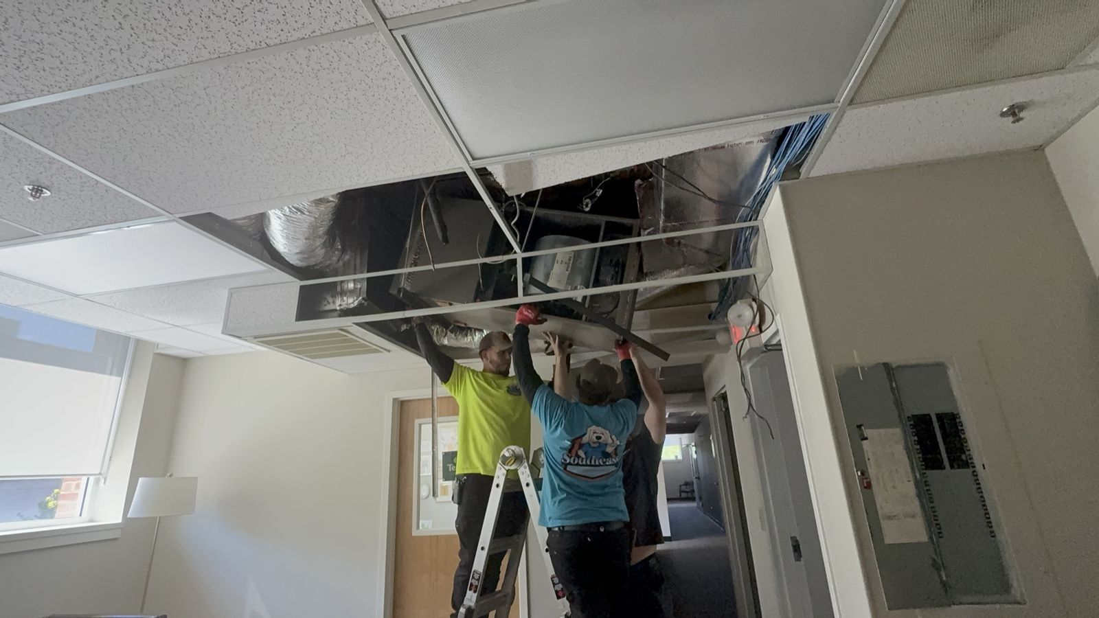 Ductwork run above a drop ceiling