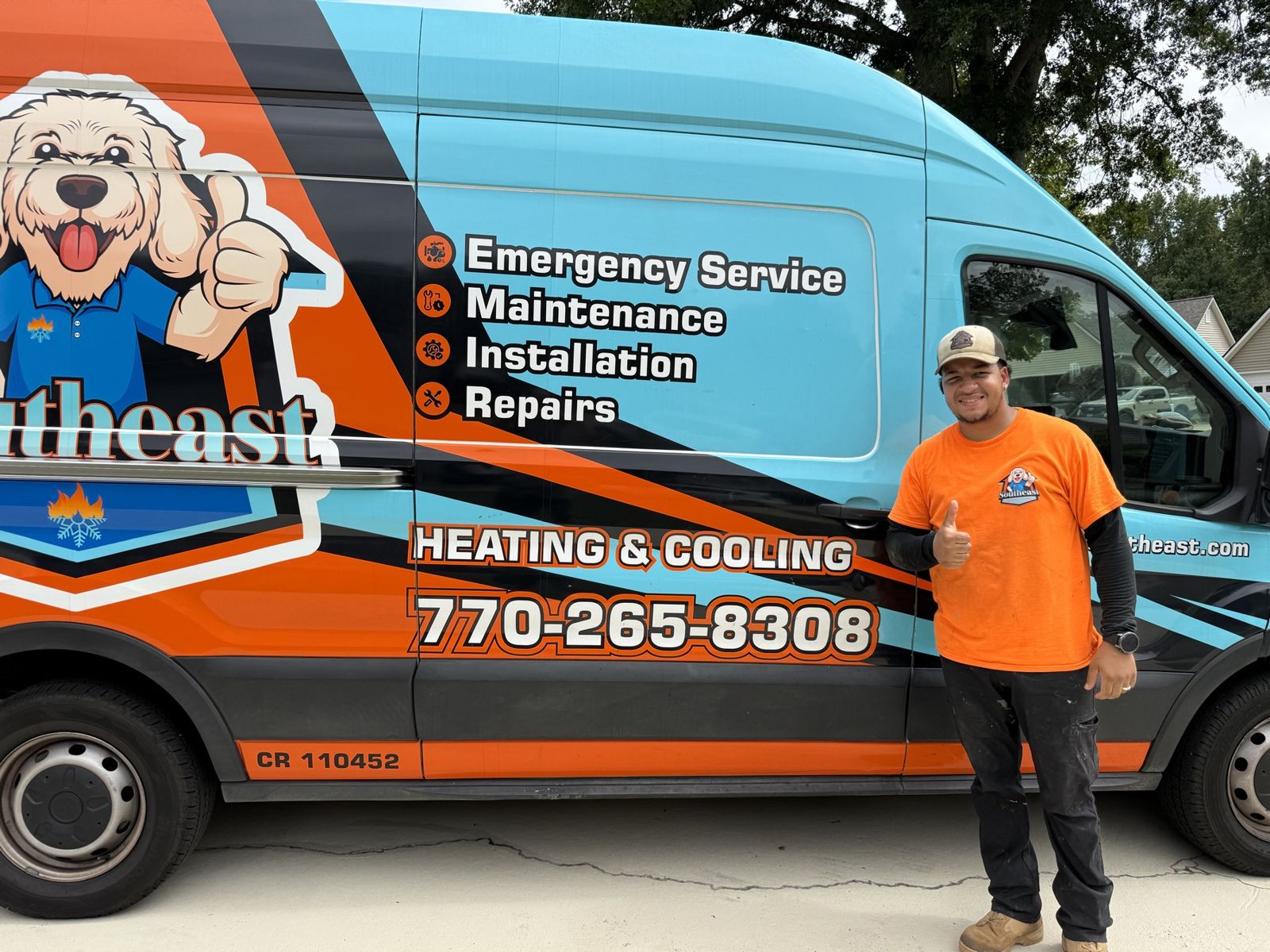 Southeast technician beside the wrapped service van