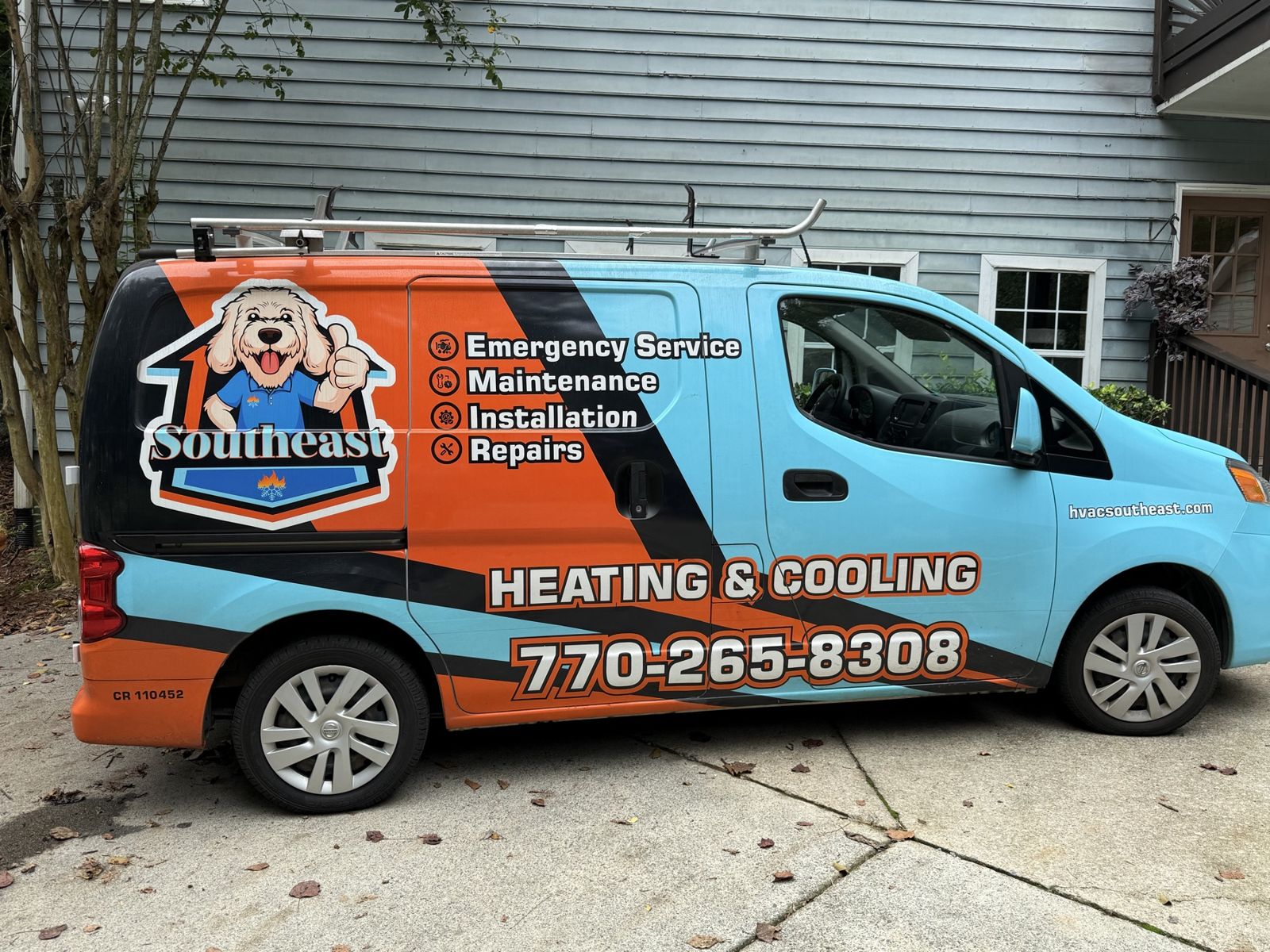 Southeast service van in a customer's driveway